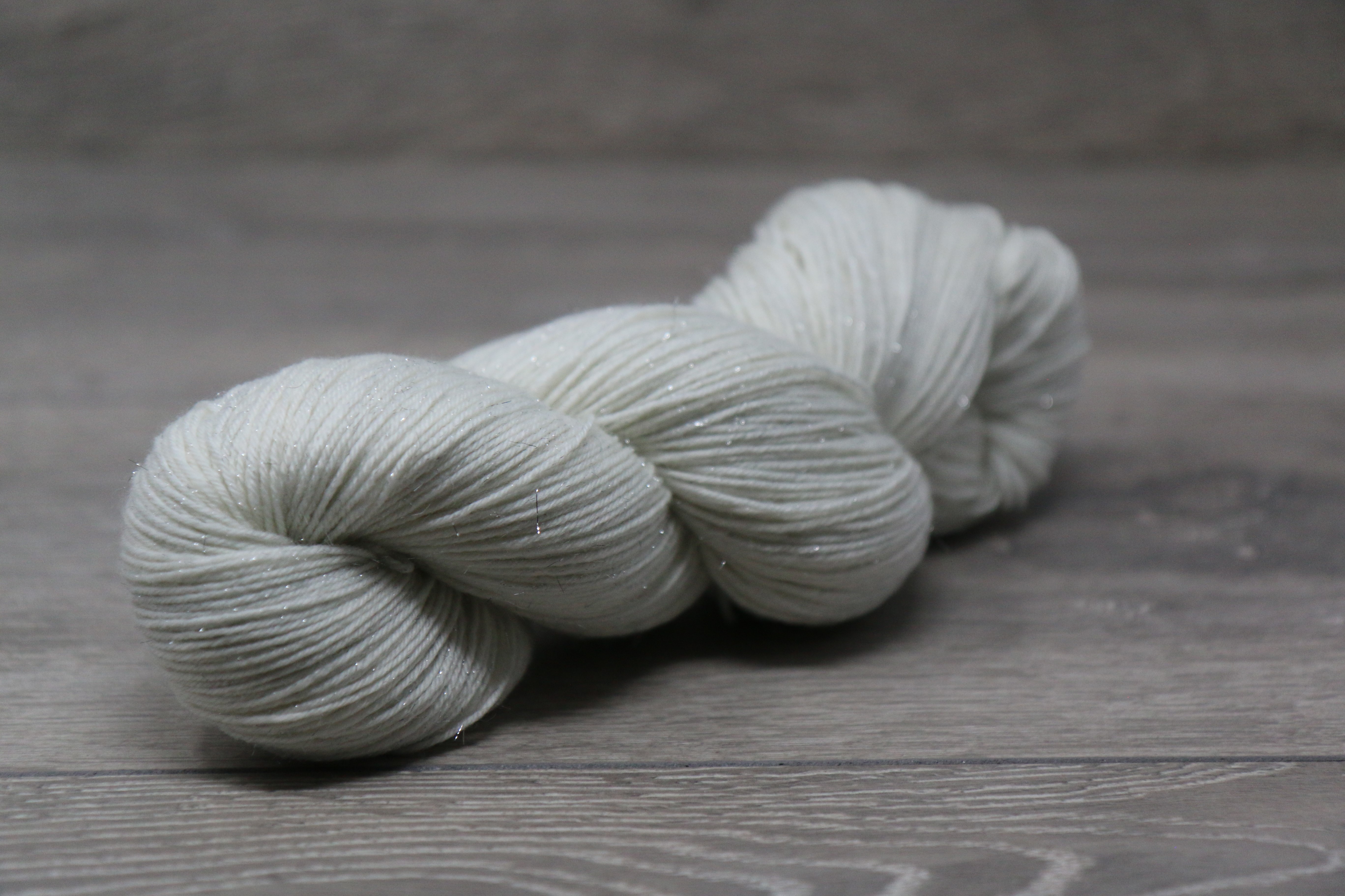 Fingering Weight 75% SW Extrafine Merino 15% Nylon 10% Silver Stellina 1 x 100g Hank